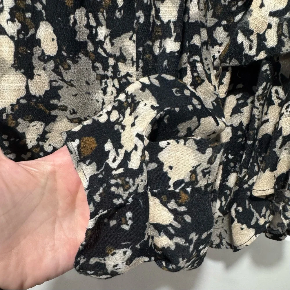 Free People Black and Cream Floral Wrap Romper with 3/4 Sleeves 02-0074